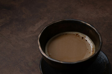 Hot Coffee in a rustic ceramic cup