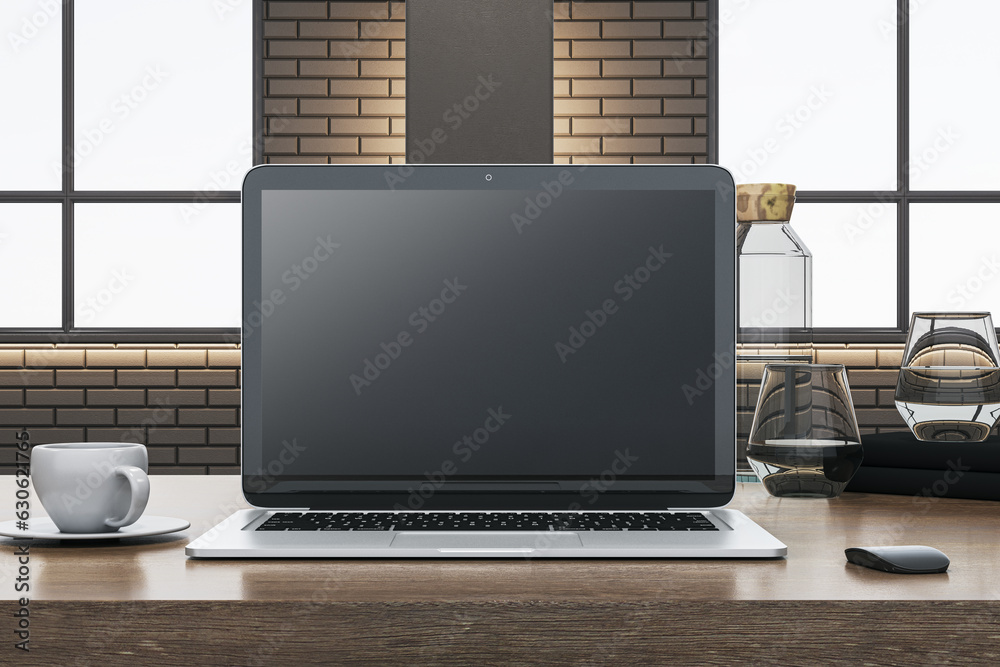 Poster close up of wooden designer office desk with empty computer, supplies and coffee cup. blurry brick w