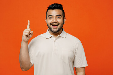 Young insighted smart proactive Indian man he wears white t-shirt casual clothes holding index...