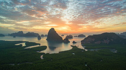.aerial view Amazing light of nature cloudscape sky above Samed Nang Chee Phang Nga archipelago....
