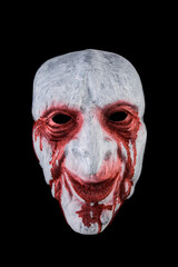 Creepy bloody head isolated on black background with clipping path