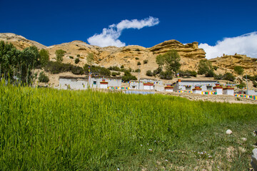 Obraz premium Century Old Gumba and Gompas monastery around Chhoser Village in Upper Mustang of Nepal
