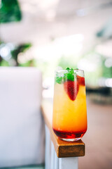 soft drink on the coffee shop flyer. refreshing sweet drink with ice on the cafe table. summer cold drink with fruits