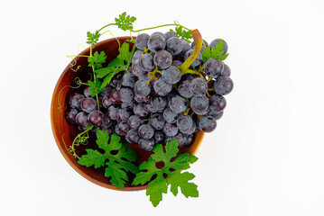 Purple grape Kyoho Grape with leaves on white background