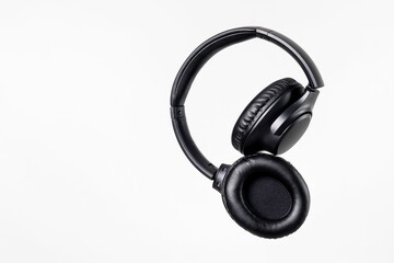 Black headphones isolated on a white background