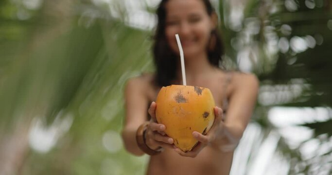 King Coconut with Straw in Bikini Beach Woman Hands Outdoors