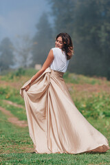 Fototapeta premium Portrait of beautiful young woman outdoor