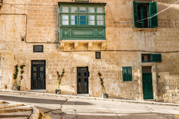 small, narrow, mediteranean alleys, parked by cars