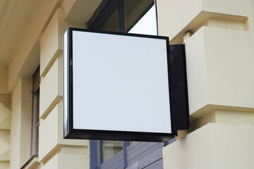 Store, shop, cafe, restaurant mounted signboard mock up design template. Blank white store sign design light box mockup.