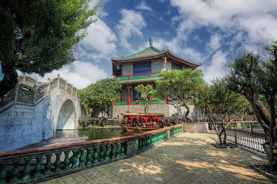 Guangzhou, Guangdong, China. Baomo Garden is located in Panyu District. The garden features common elements of Chinese Lingnan garden architecture such as ponds, bridges, pavilions. 