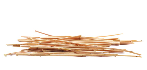 Pile dry yellow branches, twigs isolated on white, side view 