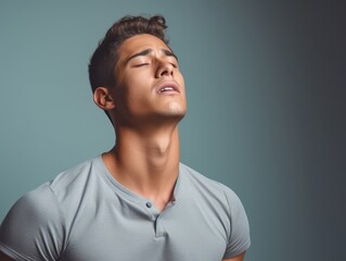 Obraz premium Studio shot of asian 30 years old man in emotional dynamic pose