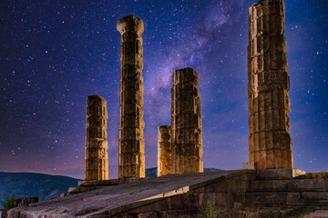 Temple of Apollo at Delphi in Greece against the stars.
