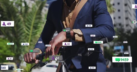 Animation of social media icons over african american man using smartwatch in street - Powered by Adobe