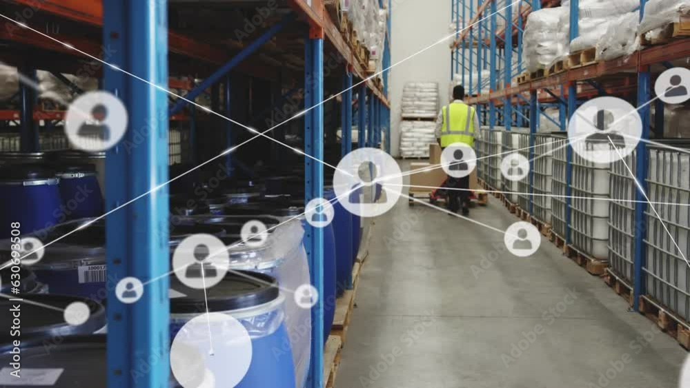 Wall mural Animation of connected profile icons over rear view of caucasian man pushing boxes on pallet jack