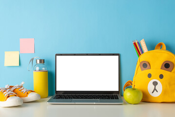 Capture back-to-school essence: side view photo of desk with school supplies, laptop, water bottle,...