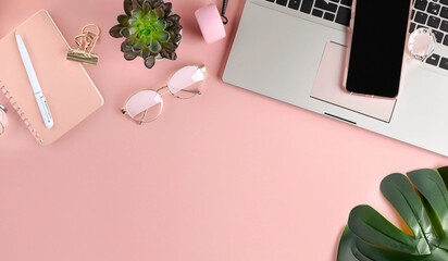 Modern Home Office Scene Laptop, Smartphone, and Feminine Accessories on Blush Background  Adobe Stock, desk with laptop