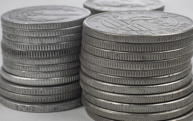 Silver coins from different countries and times - coin towers, makro
