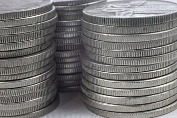 Silver coins from different countries and times - coin towers