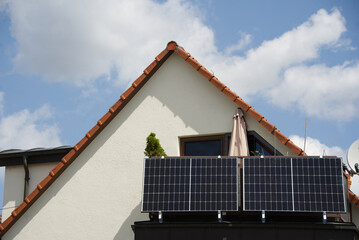 Balcony power plant - solar panels on a balcony of a top floor apartment