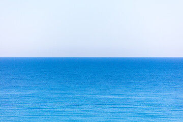Obraz premium Blue sea and sky horizon.