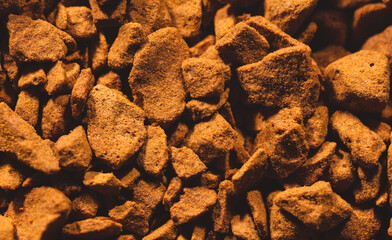 Instant coffee granules as background.