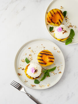 Grilled peaches with stripes.