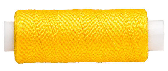 Spool with yellow thread for sewing, supply for sewing, isolated object 
