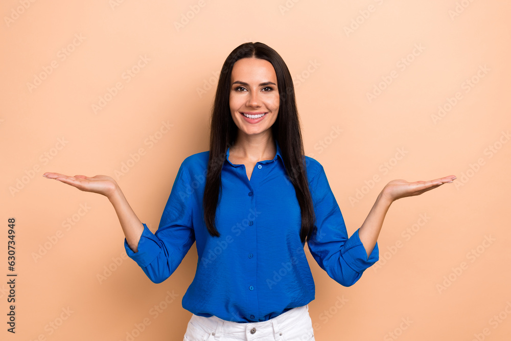 Poster Portrait of pretty lady promoter hold open palms showing empty space two products ads adv ad isolated beige color background