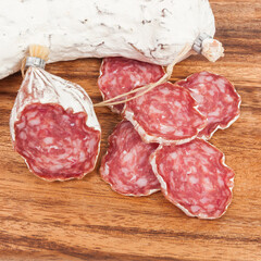 salami sausage on wooden background