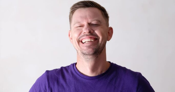 Surprised man listening to gossip and showing his indifference on white background 4k movie. Human emotions concept