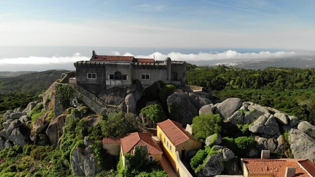 The Santuario da Peninha and Palace - Sintra, Portugal near Lisboa. Aerial drone view. Flying over. High quality 4k footage 