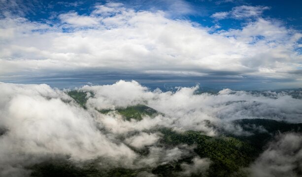 Aerial view of clouds over the Appalachian mountains at sunset.
