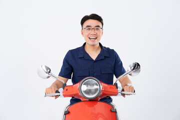 Fototapeta na wymiar a man wearing a helmet and driving a motorcycle