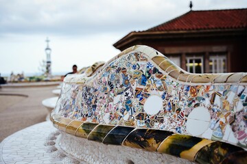 Vibrant and colorful Bench made of mosaic in Guell Park in Barcelona
