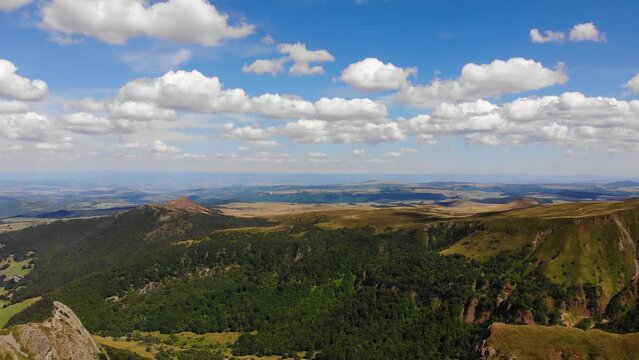 Aerial footage of Massif Central mountains. Stunning views of Cha&icirc;ne des Puys. High-quality aerial videos Mont Dore region. Cinematic shots of mountain landscapes