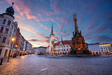 Olomouc, Czech Republic. Cityscape image of downtown Olomouc, Czech Republic with Olomouc City Hall and Honorary  Holy Trinity Column at summer sunrise. - obrazy, fototapety, plakaty