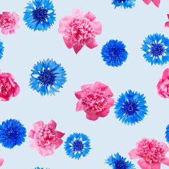 Seamless pattern of pink peony and cornflower flowers on light blue background