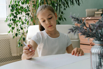 Little girl drawing with pen diy postcard for mom to mother day