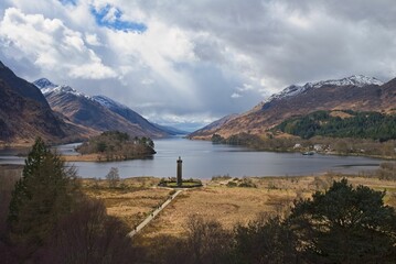 Breathtaking view of the Glenfinnan Monument and Loch Shiel from a scenic point of view