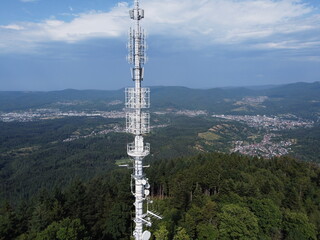 Aerial shot of the Merkur mountain and the Merkurturm radio tower in the Black Forest by Baden Baden, Germany
