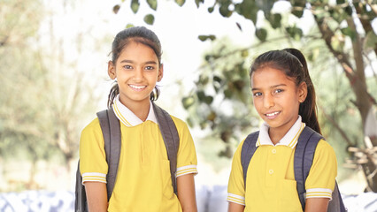Happy Indian student schoolgirl wearing school uniform. closeup, Education concept.