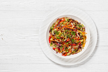 asian slaw, crunchy oriental cabbage salad in bowl