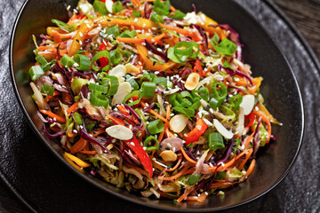 asian slaw, crunchy oriental cabbage salad in bowl