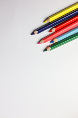 color pencils on a white background