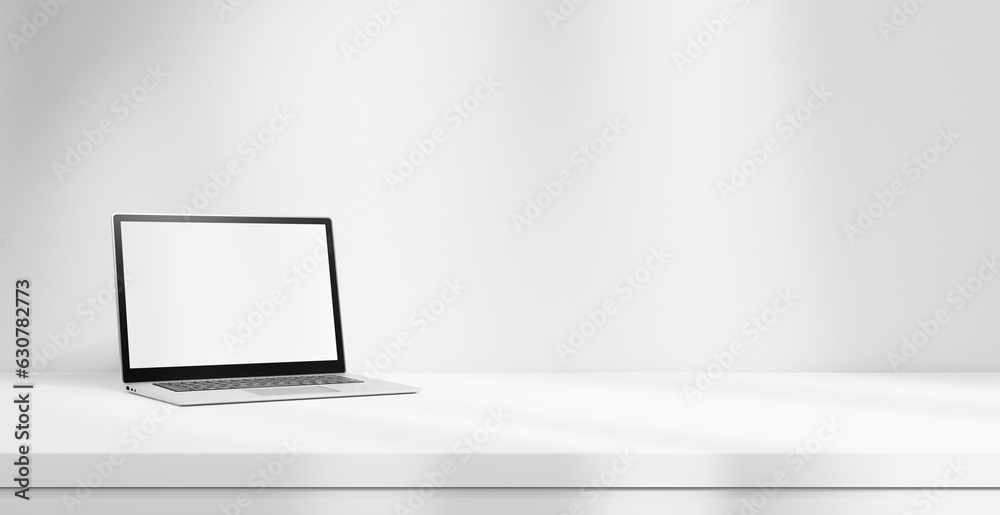 Poster Laptop mock up with white blank screen on white table isolated on white background with light beams empty space. laptop and studying, office concept, empty white table stage with laptop