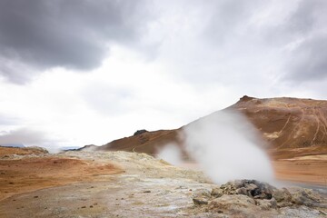 Steaming fumaroles from a geothermal spring at Hverir