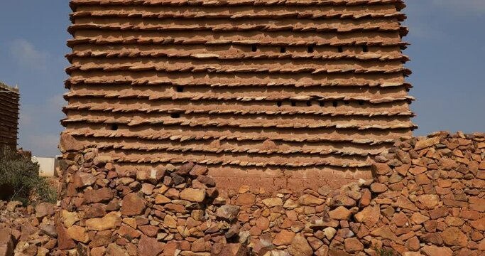 Red stone and mud houses village  Sarat Abidah  Saudi Arabia