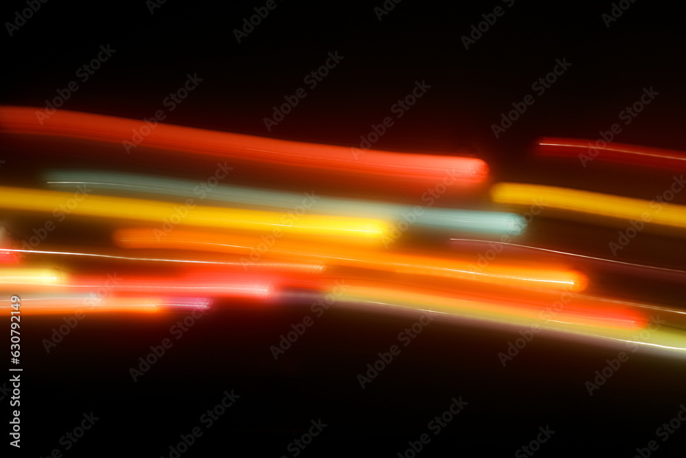Wall mural fast move lines of colorful light twinkle, long exposure motion in the dark , abstract background