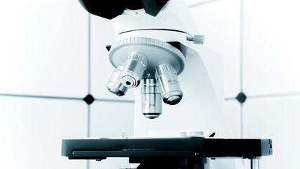 research optical microscope in blue tones